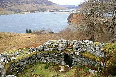 The broch peers across Loch Duich from its elevated position